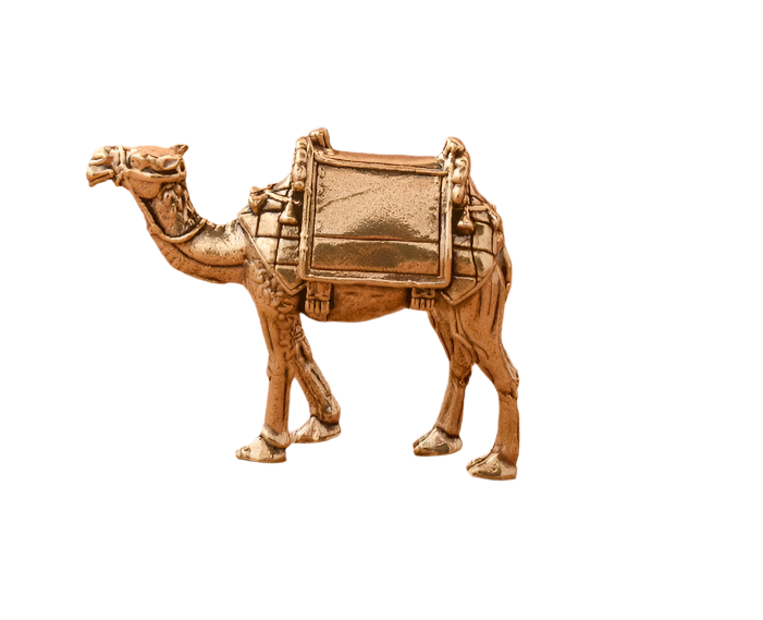 Bronze camel figurine with a saddle on a white background