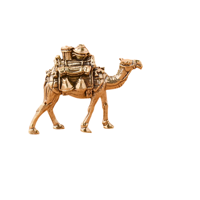 Gold-colored camel figurine on a white background